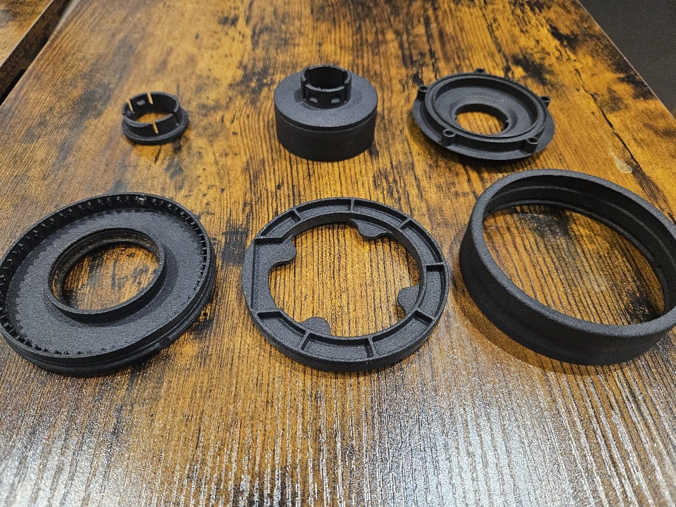 SLS 3D-printed components — exploded view showing all rotary device parts
